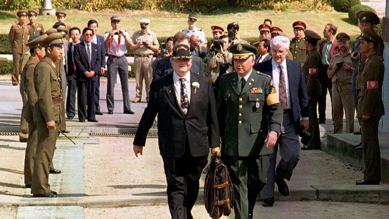 US Congressman Gary Ackerman is escorted into S Korea from the North after talks with Kim Il Sung in 1993