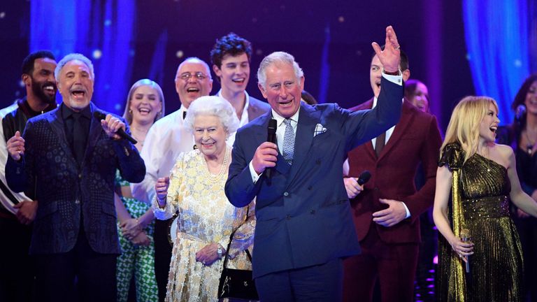 The Queen and Prince Charles join the stars on stage                                                              