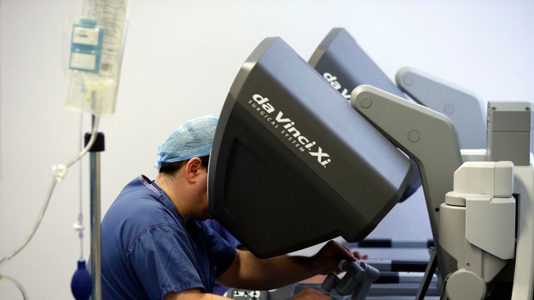 Surgery by robot is less invasive than open surgery