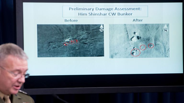 Director, Joint Staff, US Marine Lt. Gen. Kenneth F. McKenzie Jr., shows a damage assesment image of the Him Shinshar Chemical bunker site as he briefs the press on the stikes against Syria, at the Pentagon in Washington, DC, on April 14. 2018