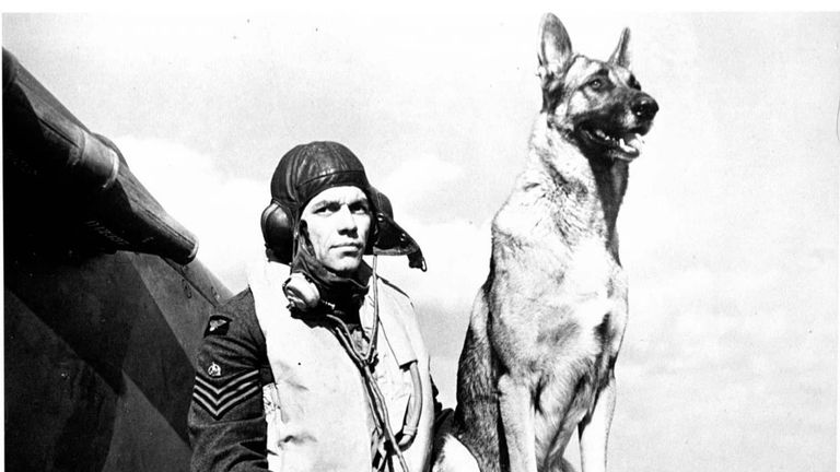 Collect photo of Wing Commander George Unwin during the Battle of Britain in 1940 with his dog "Flash" posing by a Spitfire. Unwin is the only surviving member of 19 Squadron, the Original Spitfire Squadron. PA Photos.