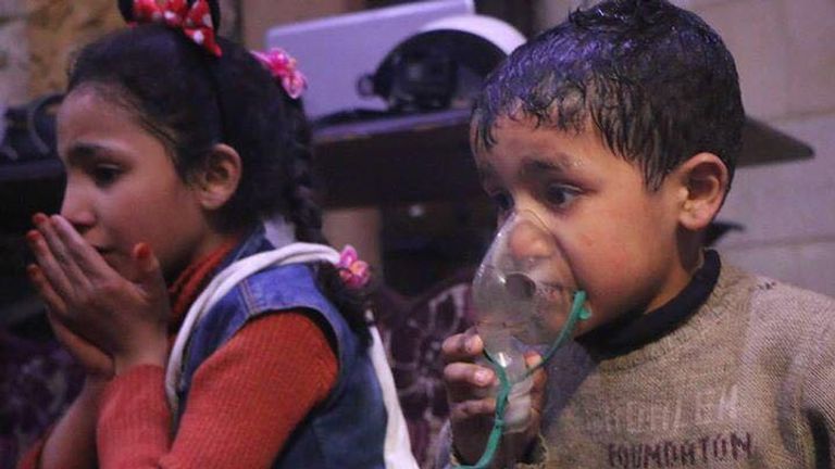 Children suffering the effects of a suspected gas attack in Douma. Pic: UOSSM