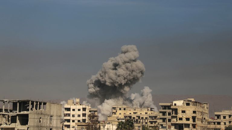 A general view shows smoke billowing in Hazeh, in the rebel enclave of Eastern Ghouta on the outskirts of Damascus on March 15 2018