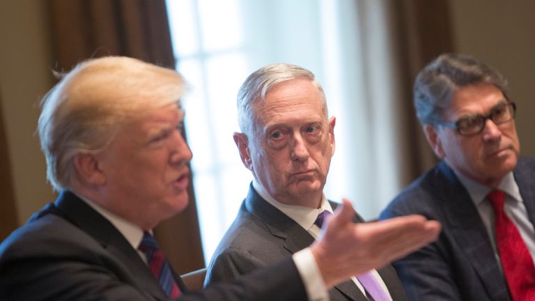 U.S. Defense Secretary James Mattis (C) and Energy Secretary Rick Perry (R) listen to President Donald Trump speak during a luncheon with the leaders of Estonia, Latvia and Lithuania on April 3, 2018 at The White House in Washington, DC. The President answered questions from the media about a wide range of issues including illegal immigration from Mexico and relations with Russia. (Photo by Chris Kleponis-Pool/Getty Images)
