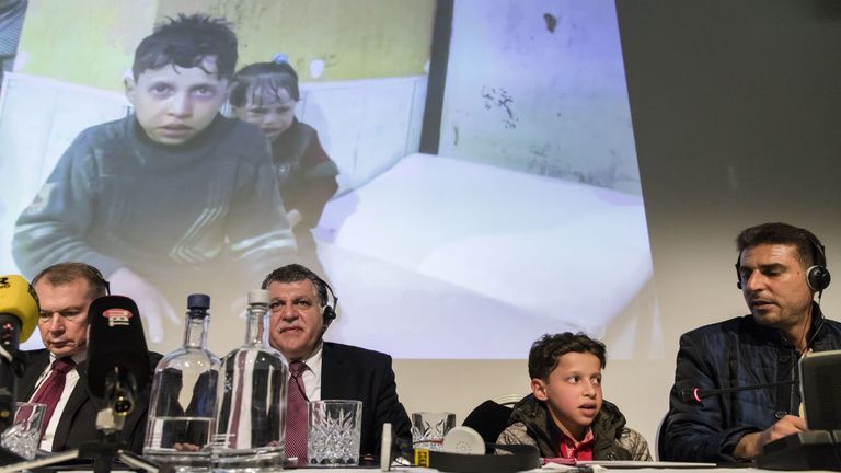 Ambassador Shulgin (L) and 11-year-old Hassan Diab, (R) at the briefing