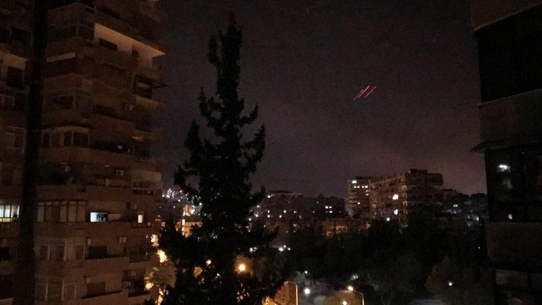Anti-aircraft fire is seen over Damascus as the US, UK and France launch airstrikes
