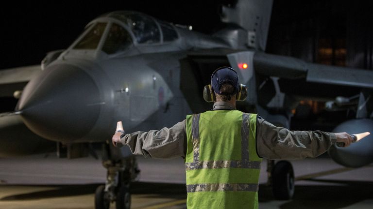 An RAF Tornado taxis into its hangar in Cyprus after completing its mission. Pic: MoD