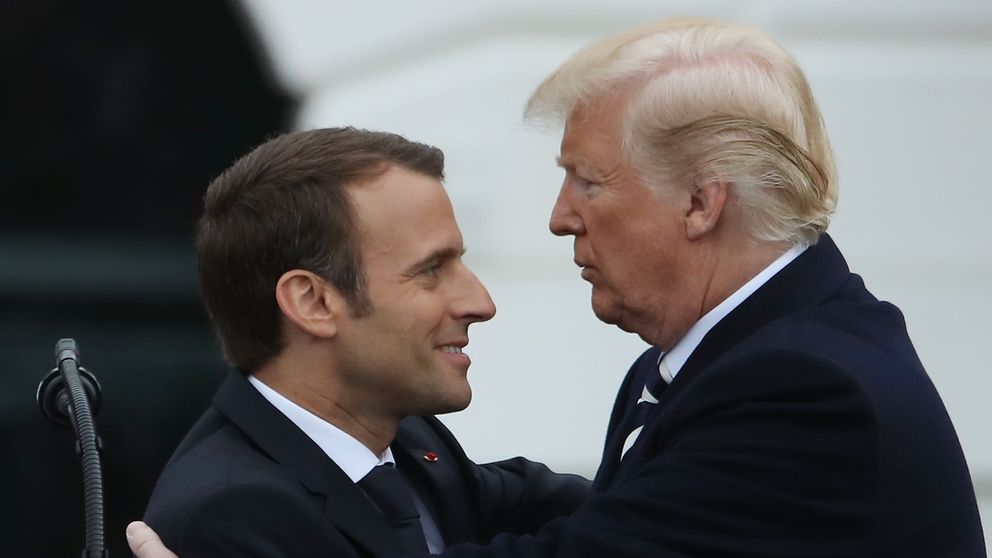 Mr Macron and Mr Trump during the welcome ceremony
