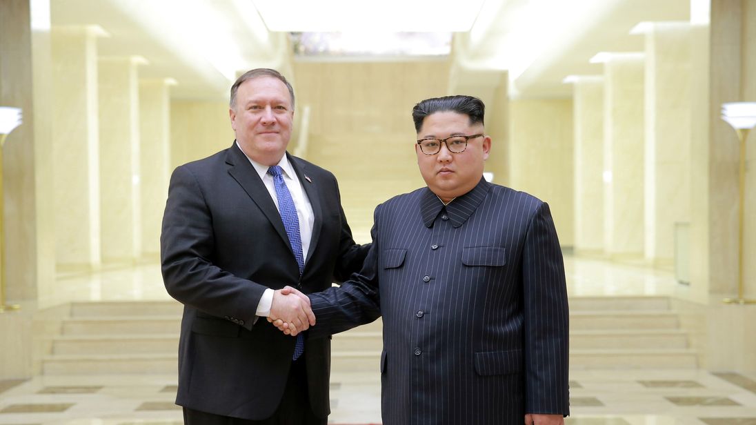 North Korean leader Kim Jong Un shakes hands with US Secretary of State Mike Pompeo