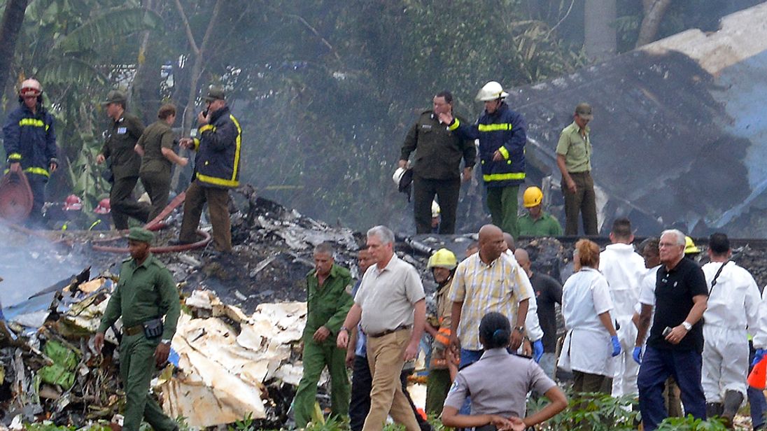 Cuban President Miguel Diaz-Canel (C) at the scene