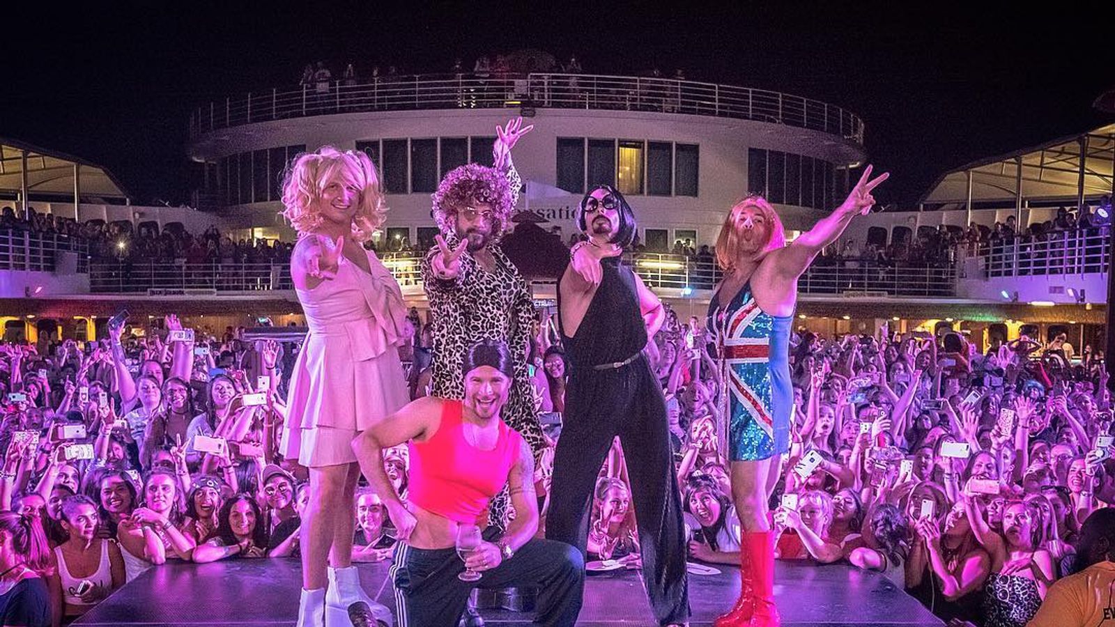 Two bands one Backstreet Boys dress up as the Spice Girls