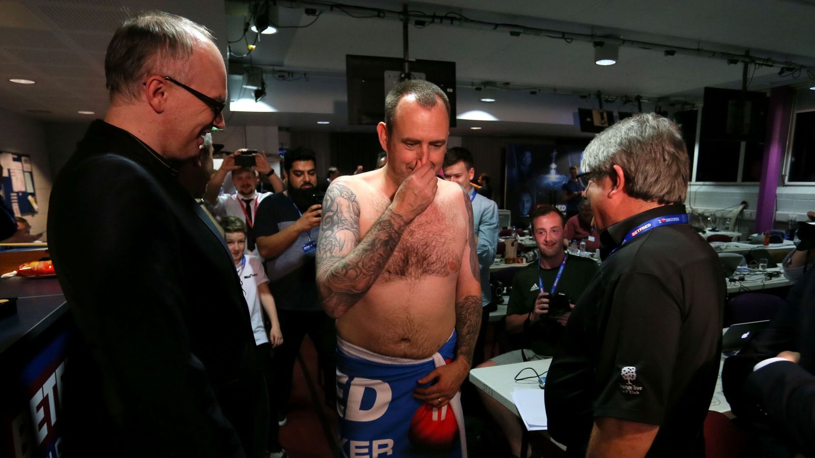 Mark Williams strips off after beating Higgins in World Snooker
