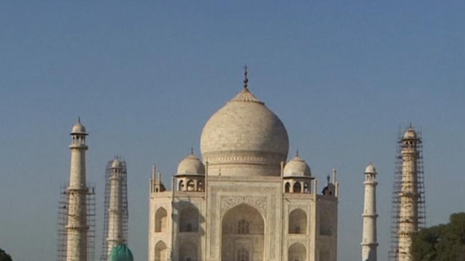 Why is the Taj Mahal changing colour? | World News | Sky News