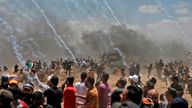 Israeli forces fire tear gas at Palestinians near the border