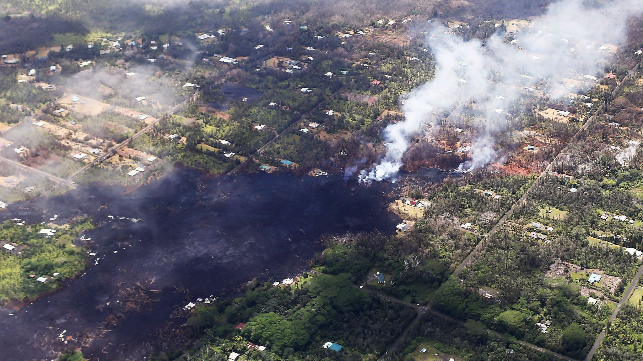 New fissure spews rock and lava from Hawaii volcano | World News | Sky News