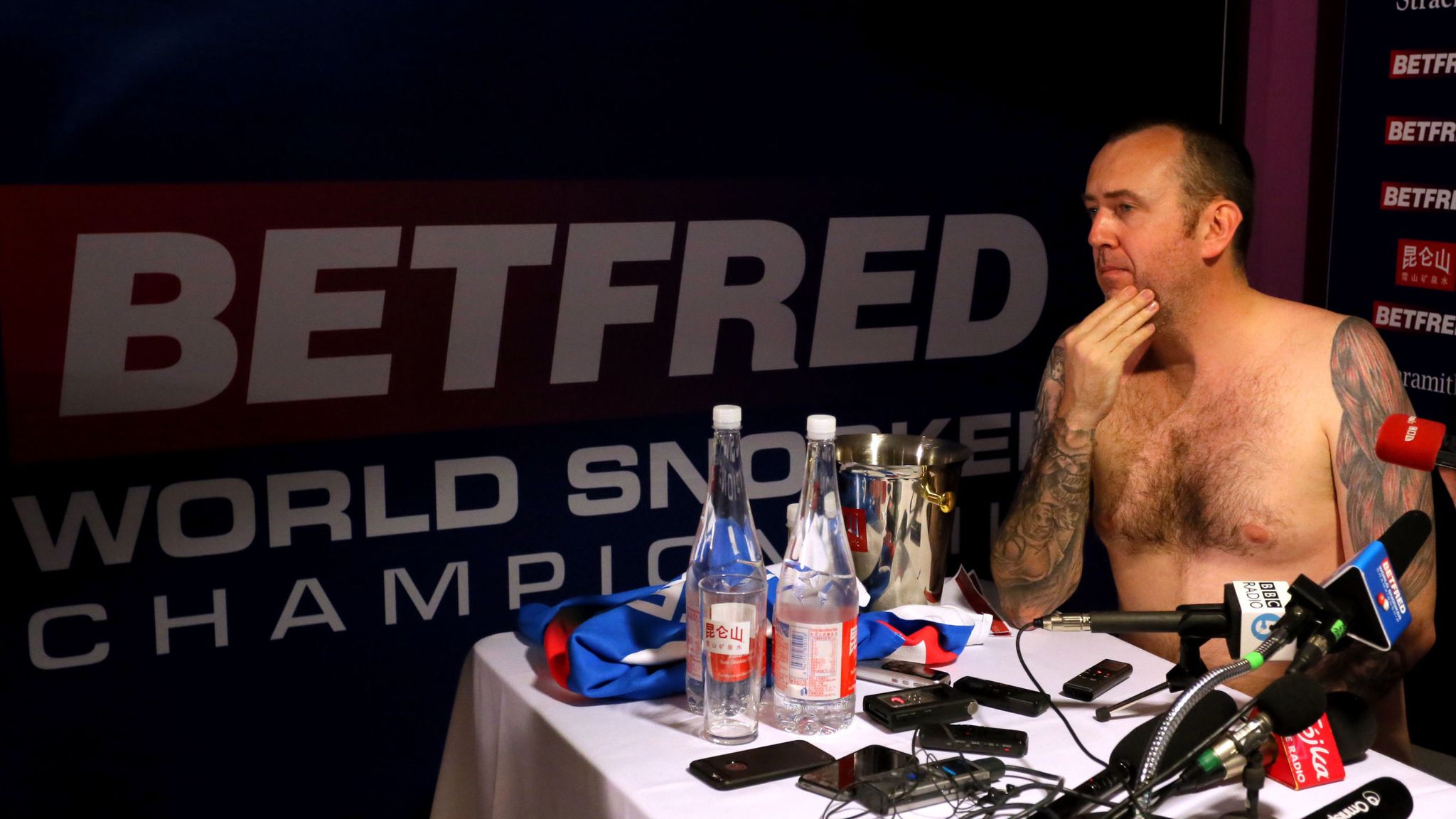 Mark Williams strips off after beating Higgins in World Snooker