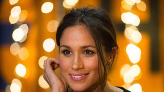 Britain's Prince Harry's fiancée US actress Meghan Markle gestures during a visit to Reprezent 107.3FM community radio station in Brixton, south west London on January 9, 2018. / AFP PHOTO / POOL / Dominic Lipinski (Photo credit should read DOMINIC LIPINSKI/AFP/Getty Images)