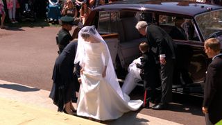 The bride, Meghan Markle, emerges