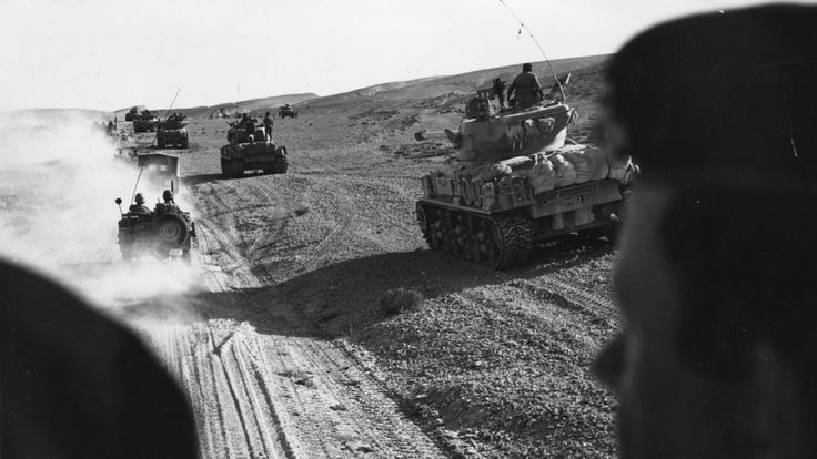 Israeli forces advancing in tanks in the Sinai Desert in 1967 during the Six Day War