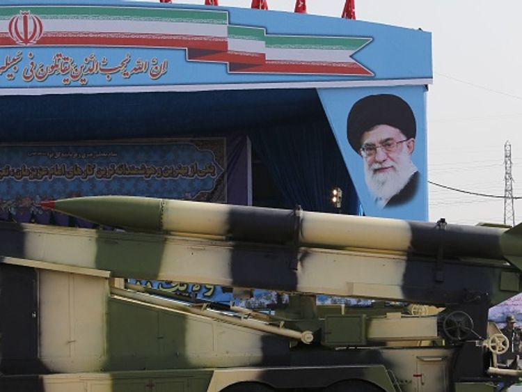 Ayatollah Khamenei's picture can be seen at a military parade in Iran in April