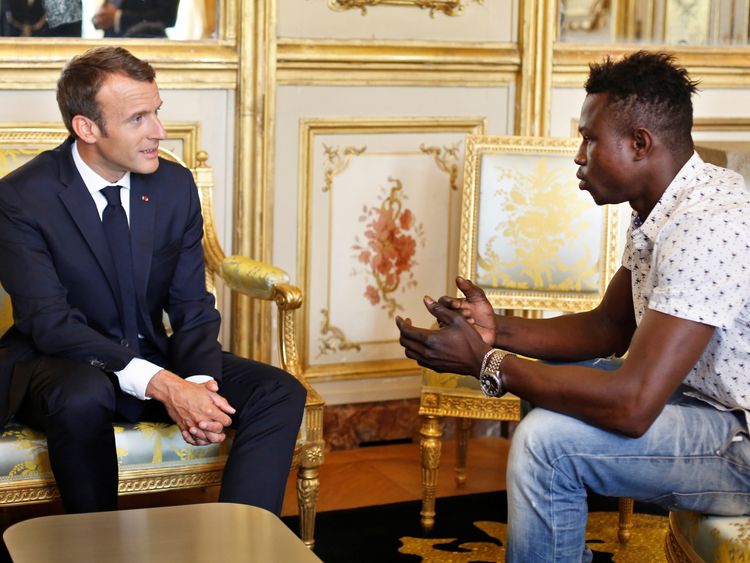 Emmanuel Macron with 'spiderman' hero Mamoudou Gassama