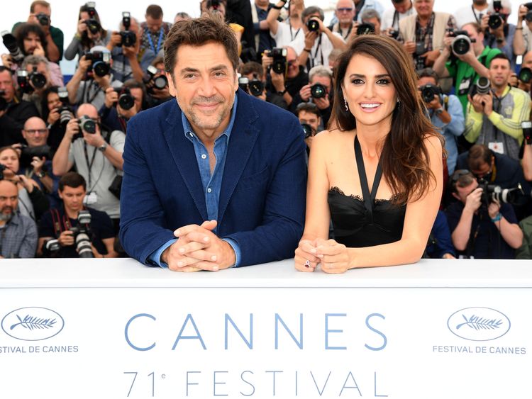 Actor Javier Bardem and actress Penelope Cruz, wearing jewels by Atelier Swarovski Fine Jewelry, attends the photocall for 'Everybody Knows (Todos Lo Saben)' during the 71st annual Cannes Film Festival at Palais des Festivals on May 9, 2018