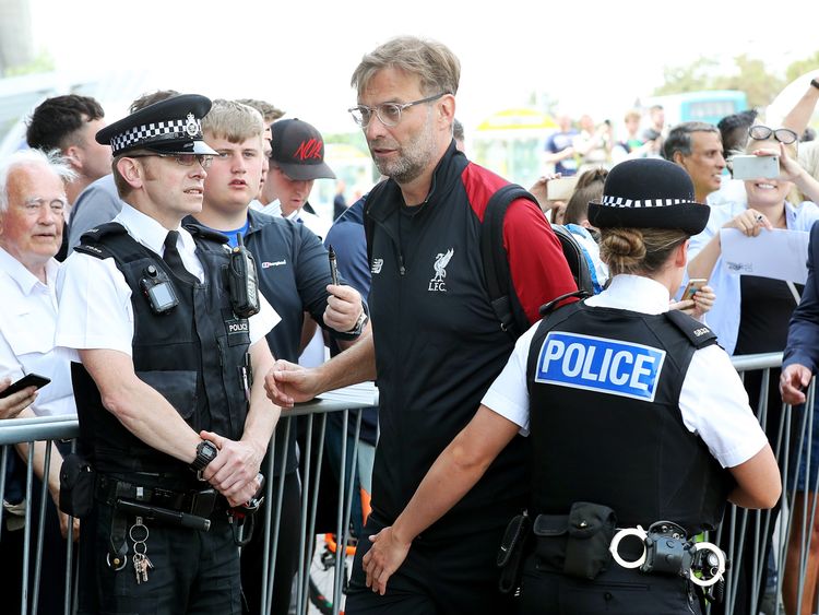 Manager Jurgen Klopp arrives at Liverpool John Lennon Airport with his team on Thursday