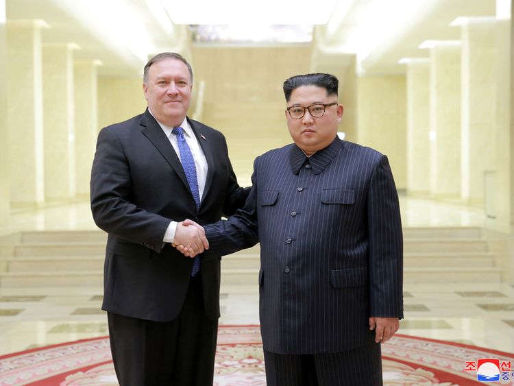 North Korean leader Kim Jong Un shakes hands with US Secretary of State Mike Pompeo