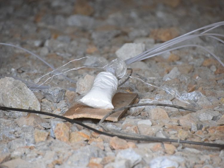 Tunnels were rigged with wires and bags of what was said to be plastic explosives