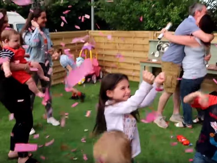 The Radford family celebrate the announcement of a baby girl expected in November