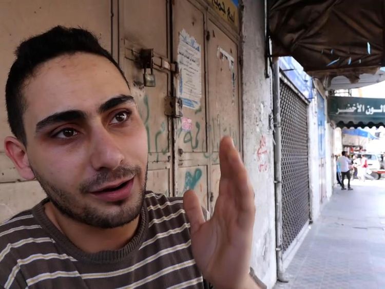 Rajaee El Jaro, is a musician and owns a shop in Gaza selling musical instruments and camera equipment