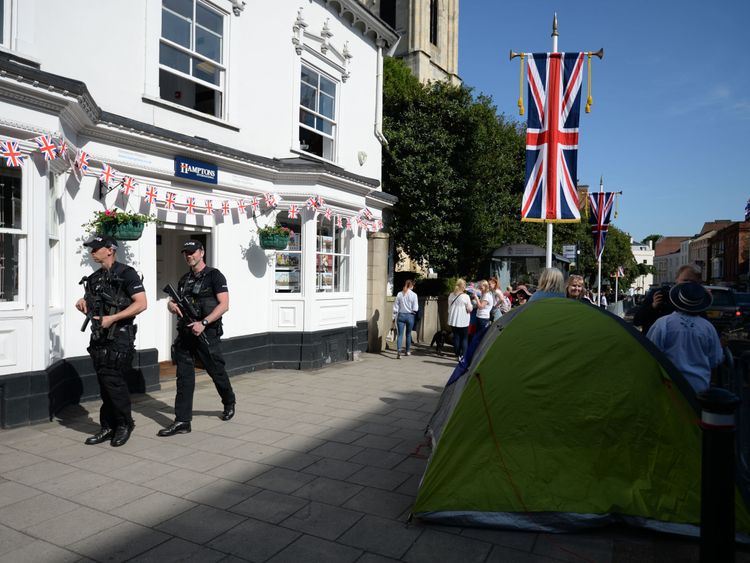 Armed police walk through the centre of Windsor ahead of the royal wedding