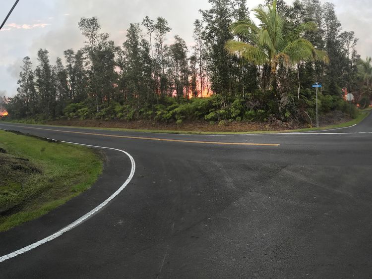 Lava emerges from the ground after Kilauea Volcano erupted, on Hawaii&#39;s Big Island