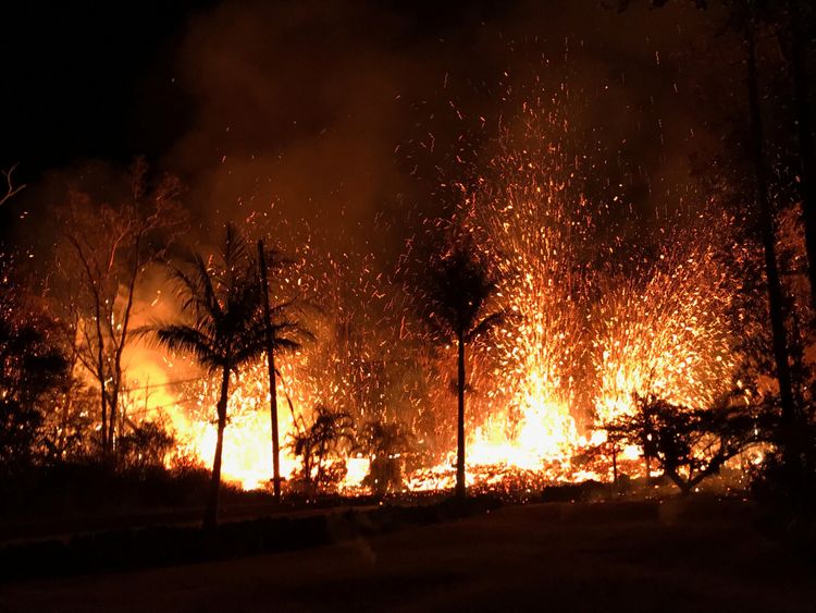 
HAWAII-VOLCANO/RTS1Q3CD6 May. 2018UNITED STATESA new fissure spraying lava fountains as high as about 230 feet (70 m), according to United States Geological Survey, is shown from Luana Street in Leilani Estates subdivision on Kilauea Volcano&#39;s lower East Rift Zone in Hawaii, U.S., May 5, 2018. Photo taken May 5, 2018. US Geological Survey/Handout via REUTERS ATTENTION EDITORS - THIS IMAGE WAS PROVIDED BY A THIRD PARTY.