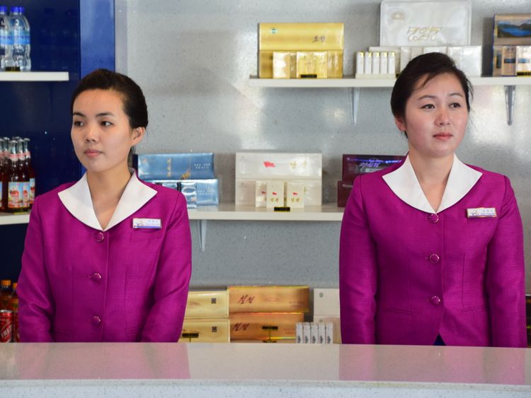 Two North Korean women at an airport kiosk in Wonsan. Pic: Michael Greenfield