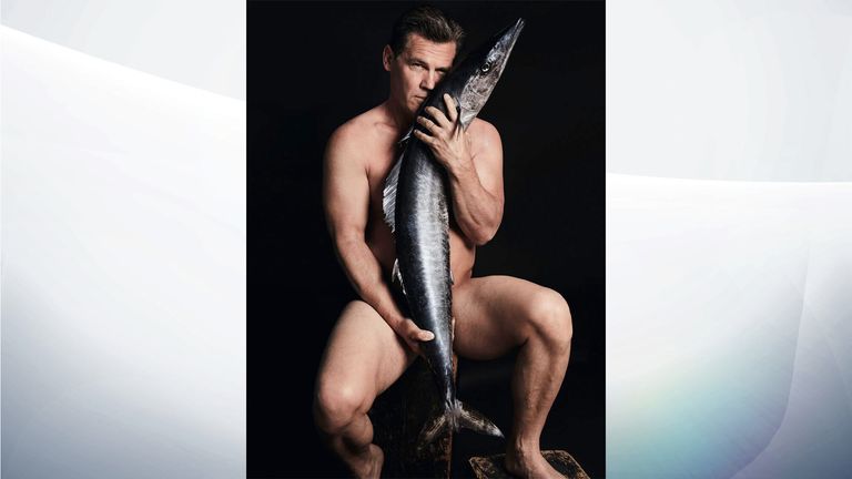 Josh Brolin strips naked and poses with a Hawaiian Wahoo fish. Pic:Fishlove/Alan Gelati