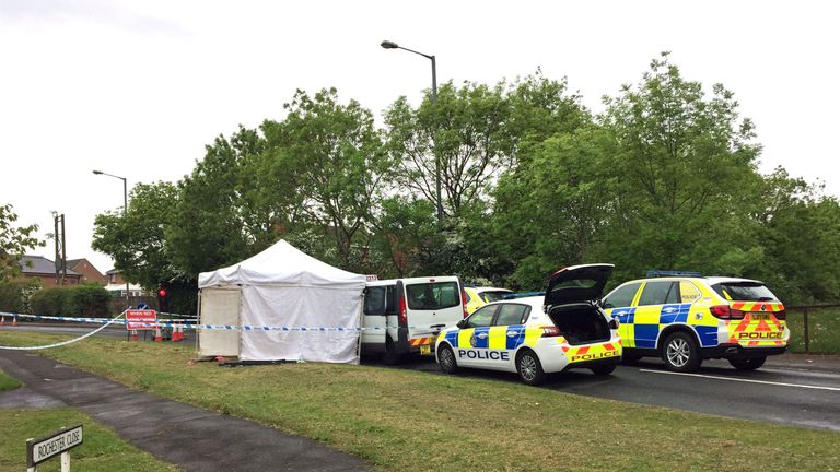 A forensic tent has been set up at the scene of the shooting