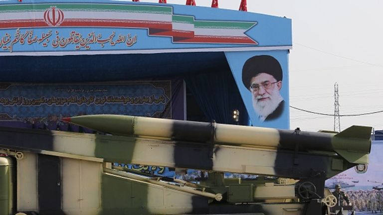 Ayatollah Khamenei&#39;s picture can be seen at a military parade in Iran in April 