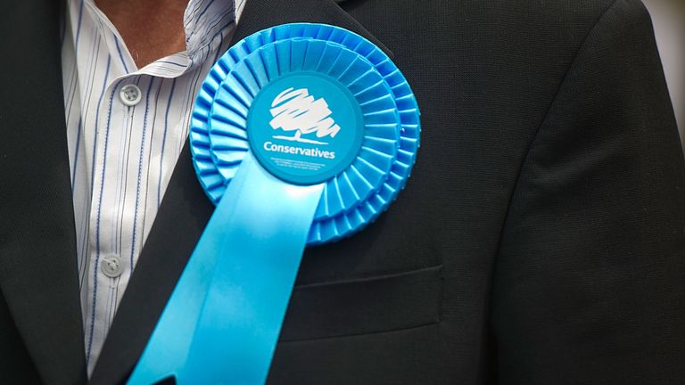 EALING, ENGLAND - MAY 21: A supporter&#39;s Conservative rosette on May 21, 2014 in Ealing, England. The rally comes in the final day of campaigning before polls open for the European Parliament election tomorrow. (Photo by Bethany Clarke/Getty Images)
