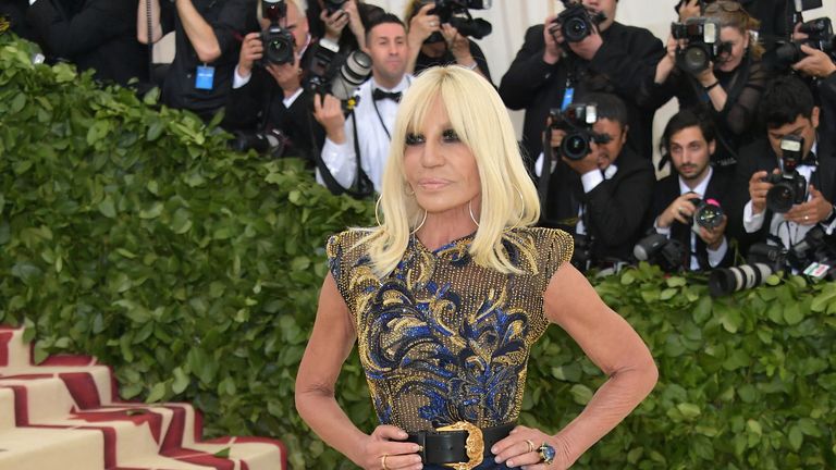 Versace fashion house bought by Michael Kors for $ to make super group  | Business News | Sky News