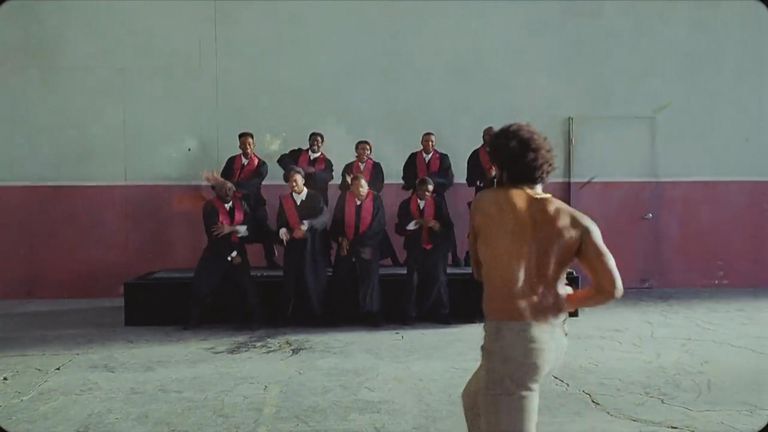 Gambino opens fire on a choir after singing and dancing with them