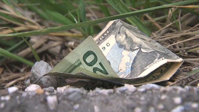 The money was scooped up by motorists on the I-70
