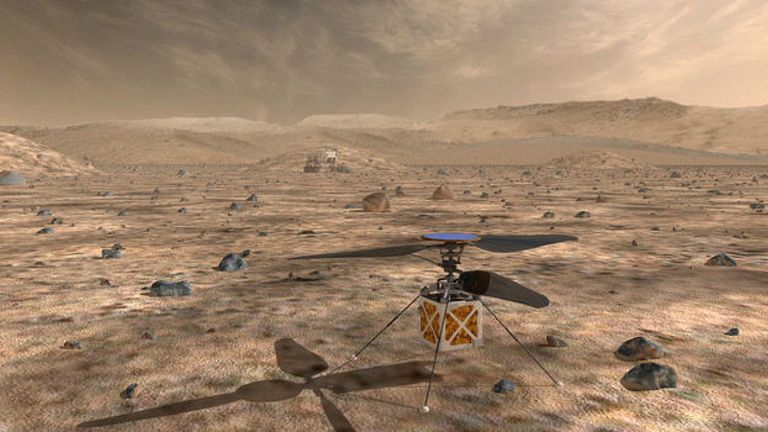 An artist&#39;s impression of the Mars Helicopter on the Red Planet. Pic: NASA