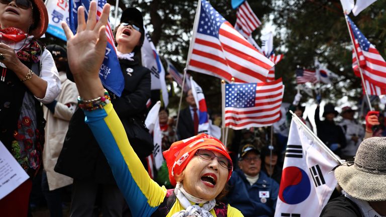 Protests against the meeting between Kim and Moon