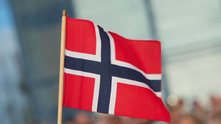 OSLO, NORWAY - MAY 31: A Norwegian flag is seen on the occasion of King Harald and Queen Sonja of Norway&#39;s 75th birthday celebration at Oslo Opera House on May 31, 2012 in Oslo, Norway. (Photo by Ragnar Singsaas/Getty Images)