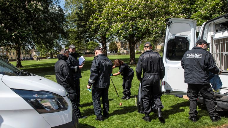 Police search teams work along The Long Walk at Windsor Castle ahead of the royal wedding