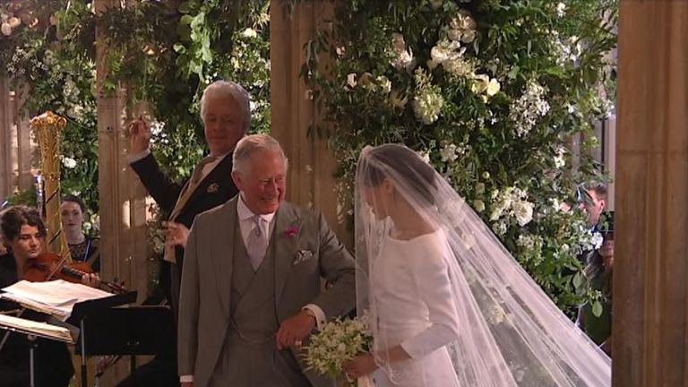 Tears from Meghan&#39;s mum as Charles walks the bride down the aisle