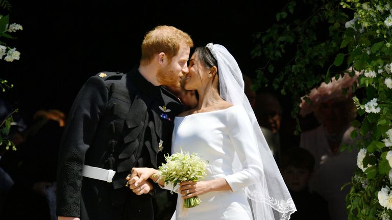 Prince Harry and Meghan Markle kiss 