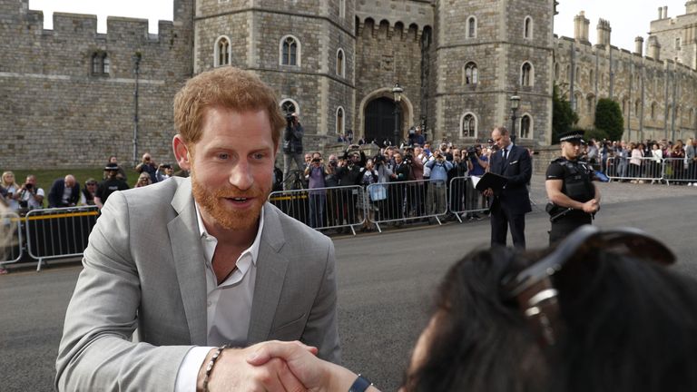 Princes greet Windsor crowds as Meghan Markle arrives at hotel with ...