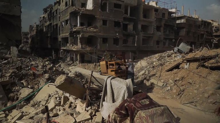 As Assad retakes Damascus district, residents find it destroyed | World ...